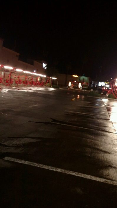 A street with many lights and buildings on it