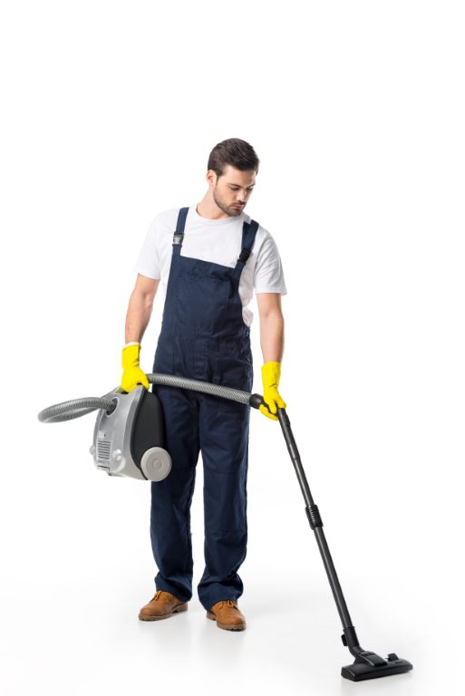 A man in overalls holding a mop and bucket.